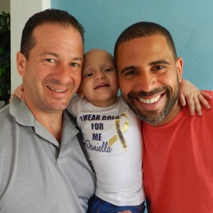 Miami Springs Mayor Zavier Garcia with Ahmed Hassan, Celebrity Landscaper, and two-year-old Daniella Callazo. 