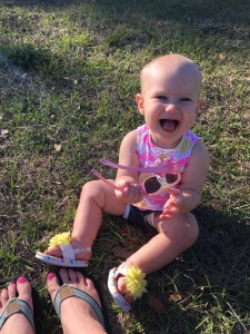 sitting on the grass with mommy