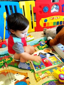 baby playing with puzzle